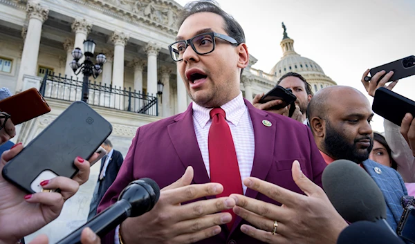 Rep. George Santos, R-N.Y., speaks to reporters outside after an effort to expel him from the House, at the Capitol in Washington, Wednesday, May 17, 2023. (AP)