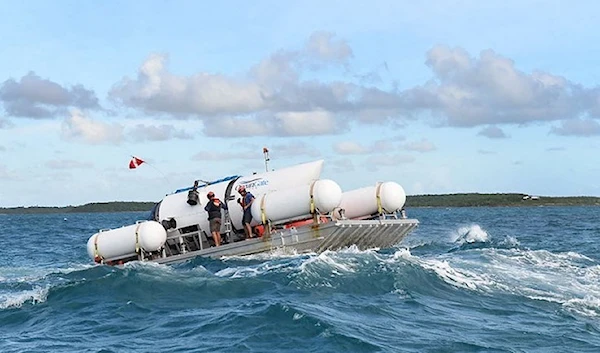 This undated image courtesy of OceanGate Expeditions, shows their Titan submersible being towed to a dive location. (AFP / OceanGate Expeditions)