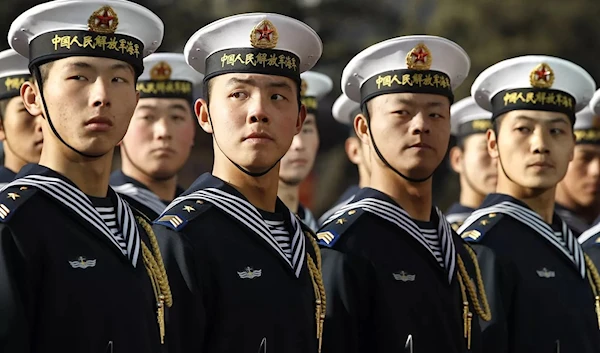 Members of a Chinese Navy honor guard wait during a welcoming ceremony (AFP)