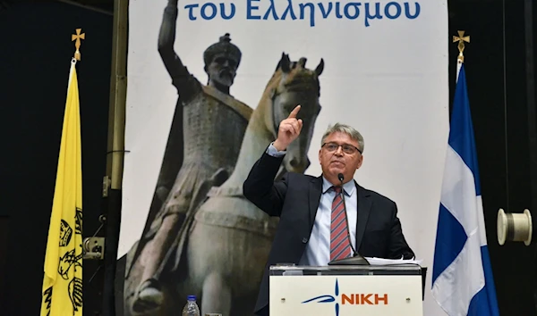 The leader of the Victory party in Greece, Dimitris Natsios, addresses supporters at an election campaign rally for parliamentary elections in Thessaloniki, Greece, June 18 2023. (AFP)