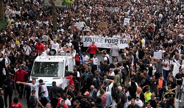 French police fire tear gas at protest for killed teen