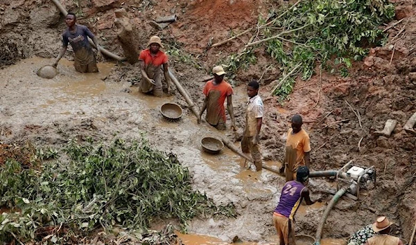 Workers at the Makala gold mine near Mongbwalu in the Ituri province, in the Democratic Republic of Congo. (Reuters)