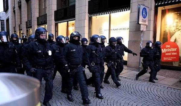 Several police officers deployed at a far-left protest in Leipzig, Germany. (AFP)