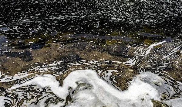 PFAS foam gathers at the the Van Etten Creek dam in Oscoda Township, Michigan. PFAS have been used in an extensive array of consumer and industrial applications. (AP)