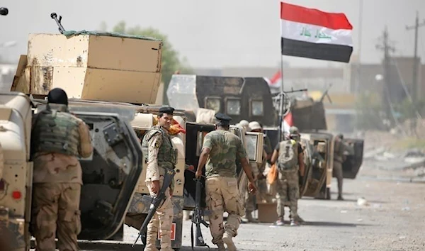 Iraqi army soldiers gather in the center of Falluja, Iraq, June 17 2016 (Reuters)