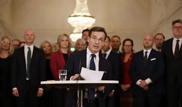 Swedish PM holds a press meeting in Stockholm, on October 18, 2022, when he promised to crack down on crime. (AP)