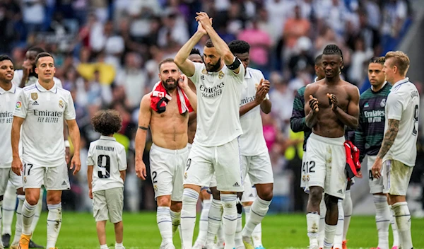 Real Madrid's Karim Benzema claps to supporters after the Spanish La Liga soccer match against Athletic Bilbao at the Santiago Bernabeu stadium in Madrid, Sunday, June 4, 2023 (AP Photo/Bernat Armangue)