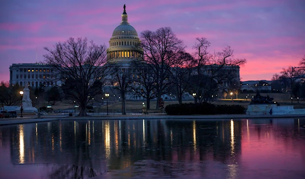 Dawn breaks over the Capitol in Washington, Tuesday, Feb. 6, 2018, as House GOP leaders are proposing to keep the government open for another six weeks by adding a year's worth of Pentagon funding to a stopgap spending bill. (AP)