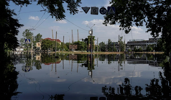 Streets are flooded in Kherson, Ukraine, Tuesday, Jun 6, 2023 after the Kakhovka dam was blown up overnight (AP Photo/Evgeniy Maloletka)