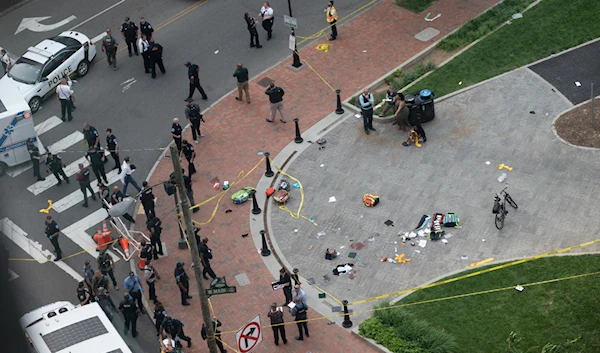 Law enforcement officers investigate the scene after a gunman opened fire in a park in Richmond, Virginia, US June 6, 2023 (Social media via Reuters)