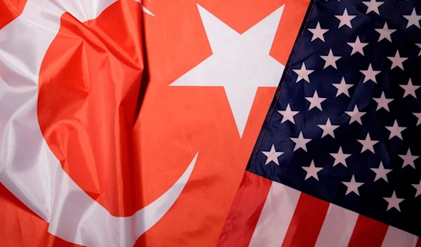 A Turkish flag is displayed next to the flag of the United States, August 25 2018. (Reuters)