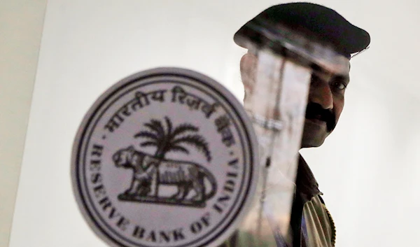 A security guard stands at the entrance of the Reserve Bank of India in Mumbai, India, October 4, 2019 (AP)