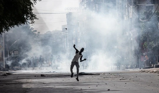 A demonstrator hurls a stone, Senegal, on June 1, 2023 during a protest. (AFP)