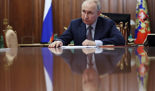 Russian President Vladimir Putin listens to Russian Federal Space Agency Roscosmos CEO Yuri Borisov during their meeting at the Krem in Moscow, Russia, June 30, 2023 (AP)