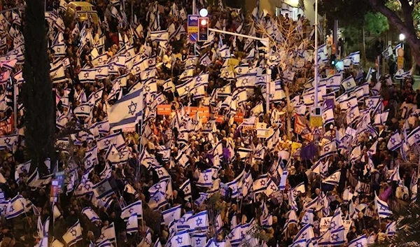 Israeli protesters attend a rally against Prime Minister Benjamin Netanyahu's new hard-right government in the coastal city of Tel Aviv on Feb 4, 2023. (AFP)