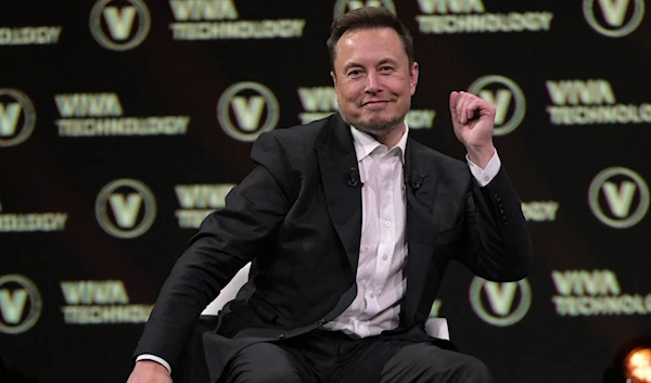 Multi billionaire Elon Musk dances while speaking at a Vivatech technology startups and innovation fair at Port de Versailles exhibition center in Paris, France, June 16 2023. (AFP)