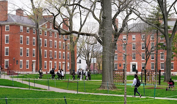 Students walk through Harvard Yard, April 27, 2022, on the campus of Harvard University in Cambridge, Massachusetts, US. (AP)