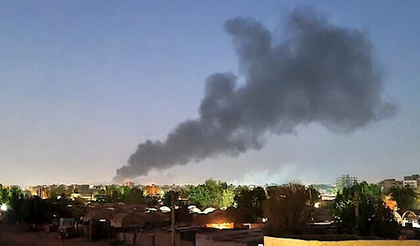 Smoke billows in Khartoum amid ongoing fighting between the forces of two rival generals in Sudan on May 6, 2023 (AFP)