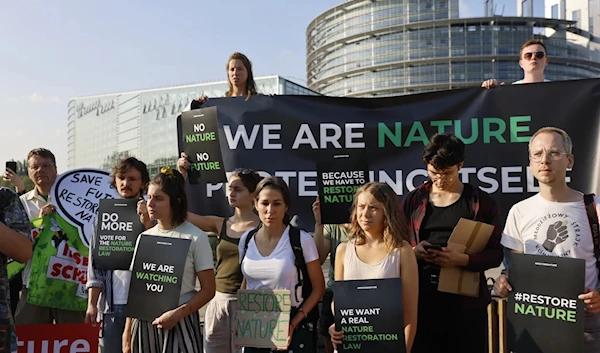 Swedish Greta Thunberg attends a demonstration with other activists outside the European Parliament, on July 11, 2023. (AP)