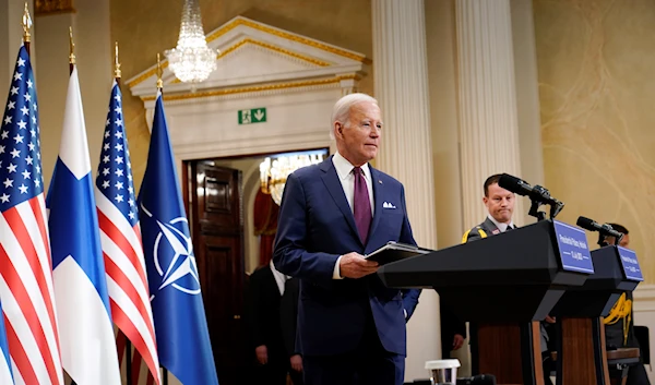 US President Joe Biden arrives for a news conference with Finland's President Sauli Niinisto at the Presidential Palace in Helsinki, Finland, Thursday, July 13, 2023. (AP)