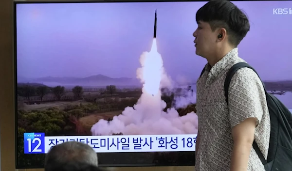 A TV screen shows a file image of the DPRK's missile launch during a news program at the Seoul Railway station in Seoul, South Korea, July 12, 2023. (AP)