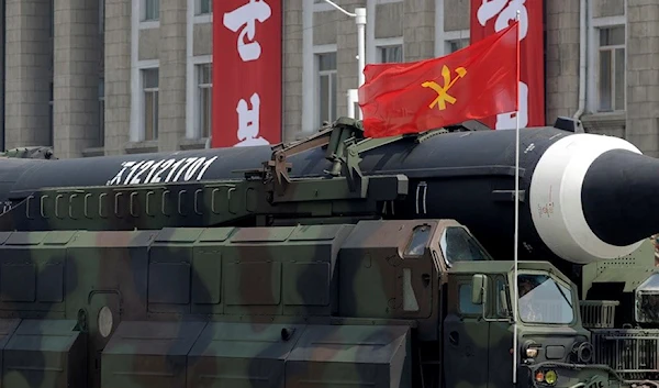 DPRK's Hwasong-12 ballistic missile is paraded across Kim Il Sung Square in Pyongyang on April 15, 2017. (AP)