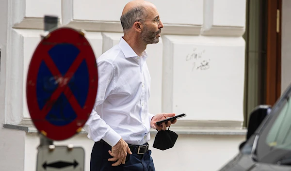 Robert Malley, US Special Envoy for Iran, walks in front of the 'Hotel Imperial' near to 'Grand Hotel Vienna' where closed-door nuclear talks take place in Vienna, Austria, June 20, 2021 (AP)