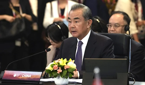 Chinese top diplomat Wang Yi speaks during the ASEAN Post Ministerial Conference with China at the ASEAN Foreign Ministers Meeting. (AP)