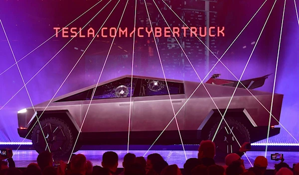 Tesla rolls out the first Cybertruck from its factory in Austin and Elon Musk congratulates the team.