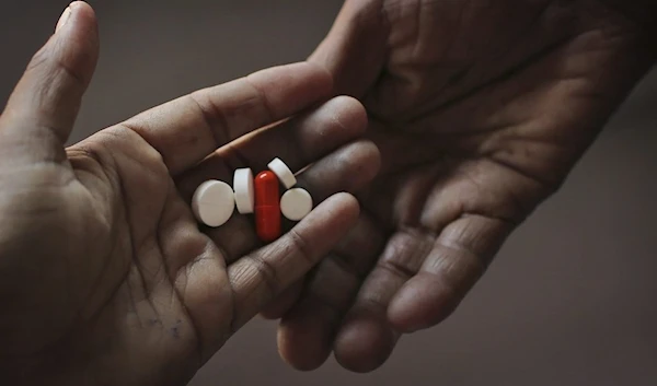 A tuberculosis patient is given medication at an Operation ASHA program center in New Delhi, India. (AP)