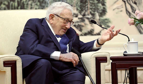 Former US Secretary of State Henry Kissinger speaks during a meeting with Chinese Foreign Minister Wang Yi (not pictured) at the Great Hall of the People in Beijing, Friday, Nov. 22, 2019.  (AP)