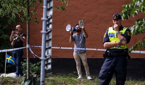 Salwan Momika, 37  in front of Stockholm's largest mosque on Wednesday June 28 2023 (AFP)