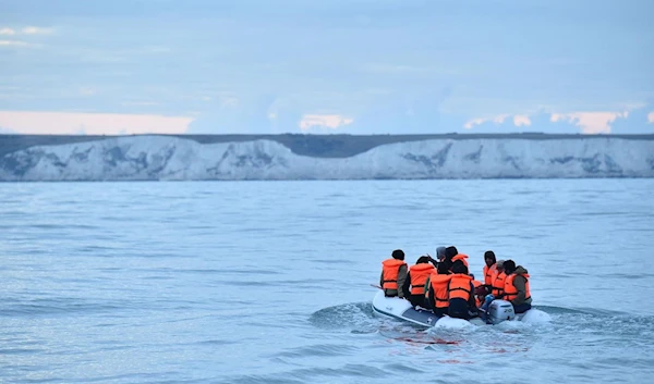 People arriving on small boats will be banned from work and claiming asylum under the bill. (AFP)