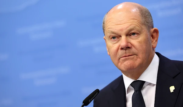 Germany's Chancellor Olaf Scholz speaks during a media conference at an EU summit in Brussels, Friday, June 30, 2023. (AP)