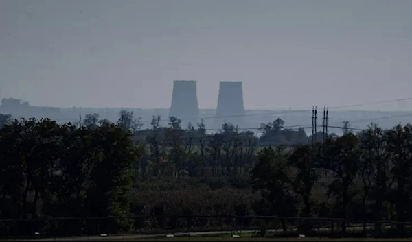 Zaporizhzhia nuclear power plant is seen from around twenty kilometers away in an area in the Dnipropetrovsk region, Ukraine, Monday, Oct. 17, 2022. (AP)