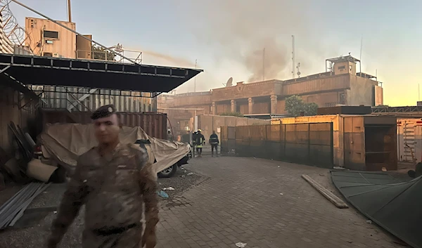 Smoke rises from the Swedish Embassy in Baghdad, July 20, 2023 (AP)