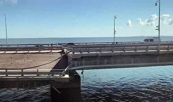 This video grab taken from Crimea24TV footage on July 17, 2023, shows the damaged Kerch bridge -- linking Crimea to Russia -- which was heavily damaged following an attack (AFP)