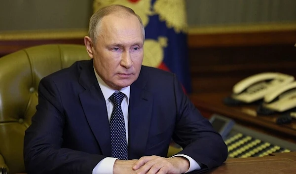 Russian President Vladimir Putin chairs a Security Council meeting via a video link in Saint Petersburg on October 10, 2022. (Sputnik via AFP)