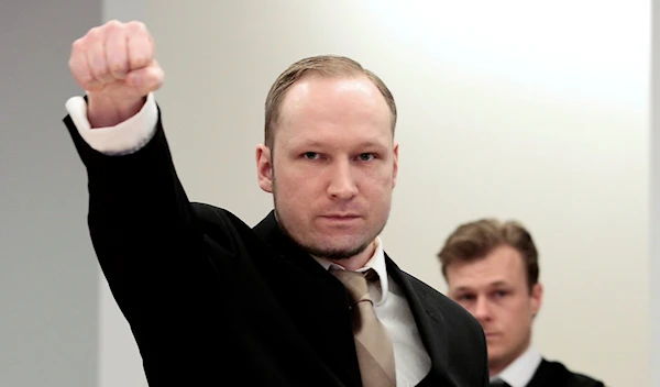 Accused Norwegian Anders Behring Breivik gestures as he arrives at the courtroom, in Oslo, Norway, April 17, 2012. (AP)