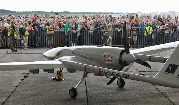 A Turkish Bayraktar TB2 combat drone is on view during a presentation at the Lithuanian Air Force Base in Siauliai, Lithuania, July 6, 2022. (AFP)