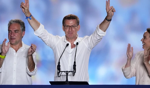 Alberto Feijoo, leader of mainstream Popular Party, gestures to supporters outside the party headquarters following Spain's general election, in Madrid, on July 24, 2023. (AP)