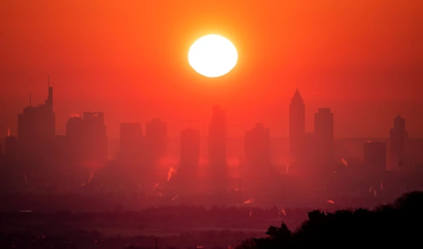 The sun rises over the buildings of the banking district in Frankfurt, Germany, Friday, Jan. 17, 2020. (AP)