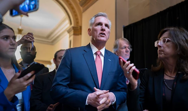 Speaker of the House Kevin McCarthy walks with reporters after votes in the House, at the Capitol in Washington on June 22. (AP)