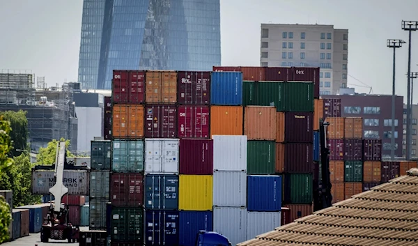 Containers are piled up at the cargo container terminal in Frankfurt, Germany, on May 31, 2023. (AP)