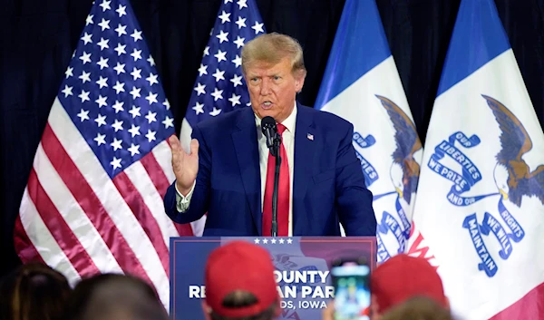 Former President Donald Trump visits with campaign volunteers at the Elks Lodge, July 18, 2023, in Cedar Rapids, Iowa (AP)