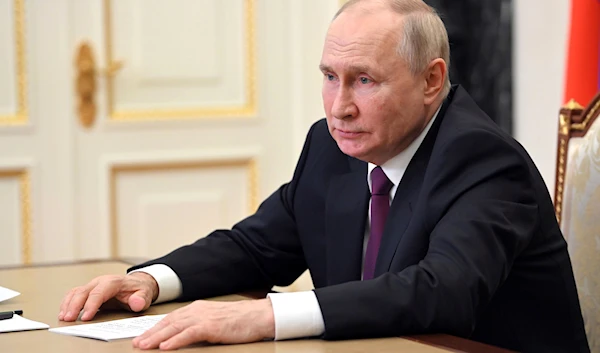 Russian President Vladimir Putin chairs a meeting on economic issues via a video conference at the Kremlin in Moscow, Russia, Tuesday, July 25, 2023. (AP)