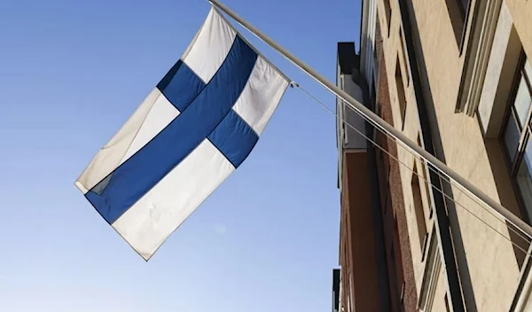 Finland’s flag flutters outside a governmental institution (AFP via Getty Images)