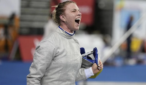 FILE - Olga Kharlan of Ukraine reacts after defeating Cyrielle Rioux of France during the women's FIE fencing sabre grand prix competition in Seoul, South Korea, Saturday, April 29, 2023. (AP)