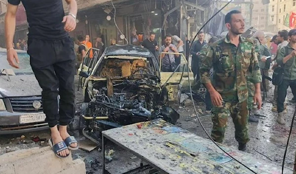 Civilians look on at the site of a terrorist attack on Sayyidah Zeinab, Damascus countryside, Syria, July 27,2023. (File Photo)