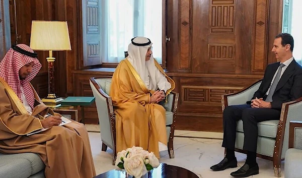 Syrian President Bashar al-Assad receiving an invitation to Arab summit from Saudi Arabia's ambassador to Jordan, Nayef bin Bandar al-Sudairi May 10 2023 (AFP)